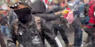Encapuchados marcha del dos de octubre